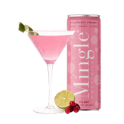 A vibrant Cranberry Cosmo mocktail served in a cocktail glass, garnished with lime and cranberries, paired with a can of Mingle Mocktails for a festive experience.