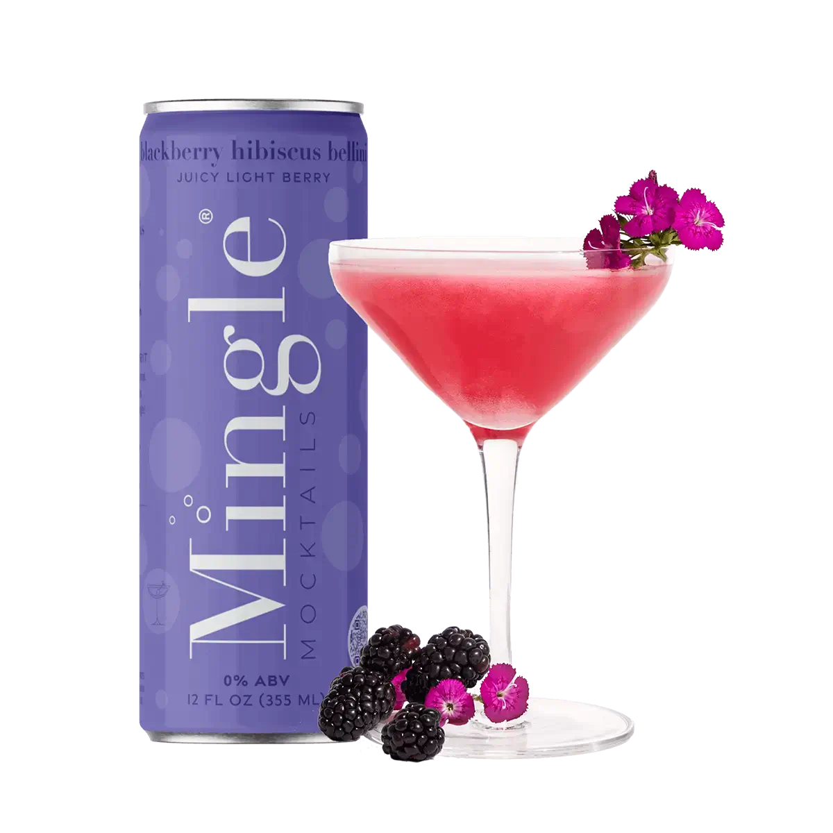 Mingle Mocktails Blackberry Hibiscus Bellini can next to a vibrant pink cocktail in a martini glass, garnished with fresh purple flowers. Blackberries and small pink flowers are arranged at the base. The can is a deep purple with white text highlighting 