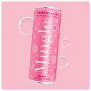 cranberry cosmo mocktail can in bright pink packaging with bubbles on a matching pink background